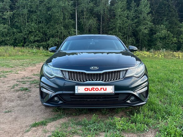 2019 Kia Optima IV Рестайлинг, синий, 1930000 рублей - вид 2