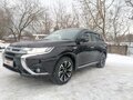 2017 Mitsubishi Outlander PHEV III Рестайлинг 2, чёрный, 2600000 рублей - вид 1