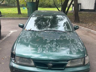 1998 Nissan Almera I (N15), зелёный, 70000 рублей, вид 1