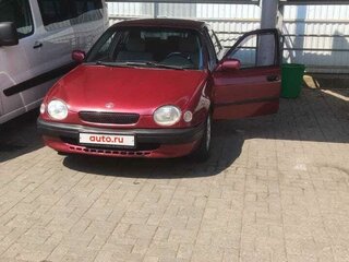 1998 Toyota Corolla VIII (E110), красный, 395000 рублей, вид 2