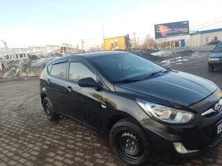 2011 Hyundai Solaris I, чёрный, 585000 рублей, вид 1