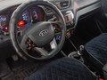 2012 Kia Rio 5-speed III, чёрный, 900000 рублей - вид 7