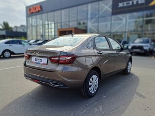 2026 Lada (ВАЗ) Vesta I Рестайлинг (NG), коричневый, 1735900 рублей, вид 5