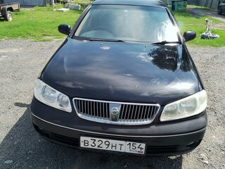 2003 Nissan Sunny N16, чёрный, 450000 рублей, вид 1