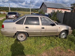 2013 Daewoo Nexia I Рестайлинг, золотистый, 180000 рублей, вид 2