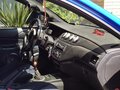 2004 Mitsubishi Lancer Evolution VIII, синий - вид 5