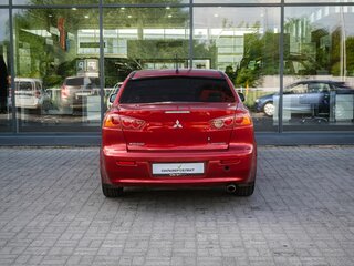 2008 Mitsubishi Lancer X, красный, 490000 рублей, вид 4