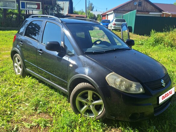 2009 Suzuki SX4 I (Classic) Рестайлинг, чёрный, 600000 рублей - вид 2