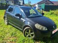 2009 Suzuki SX4 I (Classic) Рестайлинг, чёрный, 600000 рублей - вид 2