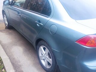 2008 Mitsubishi Lancer X, серый, 590000 рублей, вид 4
