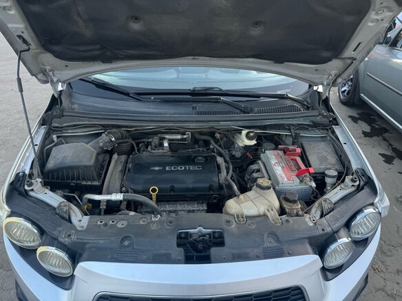 2012 Chevrolet Aveo II, серебристый, 650000 рублей - вид 17