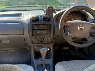 2000 Mazda Familia VIII (BJ), белый, 175000 рублей, вид 5