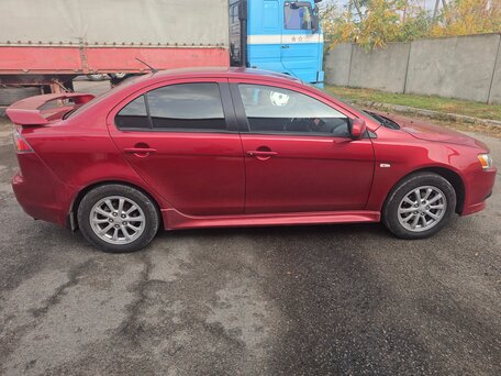 2013 Mitsubishi Lancer X Рестайлинг, красный, 900000 рублей, вид 3