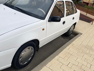 2012 Daewoo Nexia I Рестайлинг, белый, 220000 рублей, вид 2