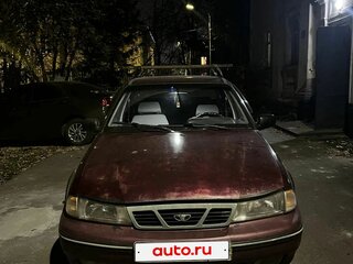 2005 Daewoo Nexia I, пурпурный, 100000 рублей, вид 1
