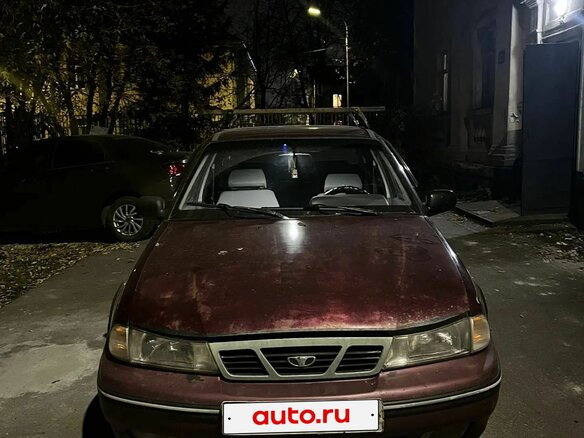 2005 Daewoo Nexia I, пурпурный, 100000 рублей