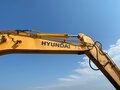 2013 Hyundai R210W, золотистый - вид 1