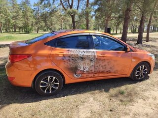 2015 Hyundai Solaris I Рестайлинг, оранжевый, 990000 рублей, вид 3