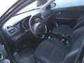 2015 Kia Rio III Рестайлинг, чёрный, 1100000 рублей - вид 4