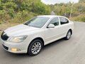 2012 Skoda Octavia II (A5) Рестайлинг, белый, 1090000 рублей