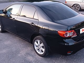 2010 Toyota Corolla X (E140, E150), чёрный, 955000 рублей, вид 4