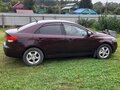 2010 Kia Cerato 6-speed II, пурпурный, 600000 рублей - вид 3
