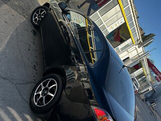 2010 Mitsubishi Lancer X, чёрный, 355000 рублей, вид 2
