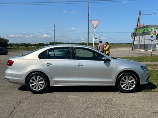 2015 Volkswagen Jetta VI Рестайлинг, серебристый, 1250000 рублей, вид 4