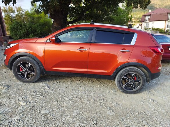 2012 Kia Sportage III, оранжевый, 1150000 рублей - вид 3