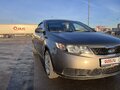 2011 Kia Cerato 5-speed II, серый, 920000 рублей - вид 4