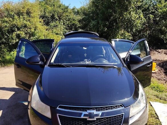 2011 Chevrolet Cruze I, чёрный, 625000 рублей - вид 2