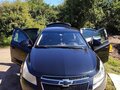 2011 Chevrolet Cruze I, чёрный, 625000 рублей - вид 2