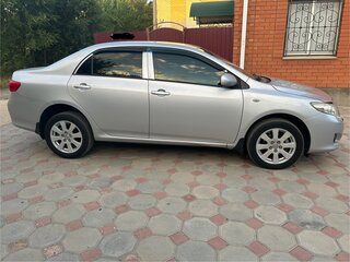 2007 Toyota Corolla X (E140, E150), серебристый, 900000 рублей, вид 2