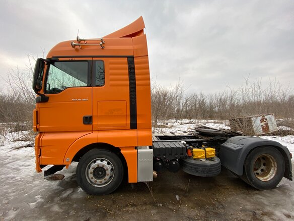 2017 MAN TGX, оранжевый, 6450000 рублей - вид 1
