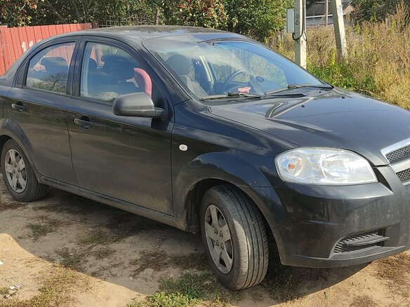 2011 Chevrolet Aveo I Рестайлинг, чёрный, 230000 рублей - вид 4