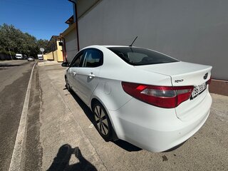 2011 Kia Rio 4-speed III, белый, 1050000 рублей, вид 5