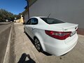 2011 Kia Rio 4-speed III, белый, 1050000 рублей - вид 4