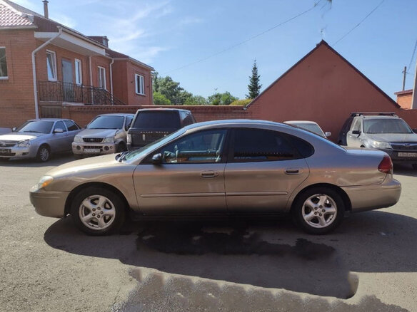 2003 Ford Taurus IV, серый - вид 2