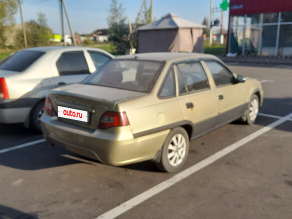 2010 Daewoo Nexia I Рестайлинг, золотистый, 160000 рублей - вид 5