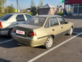 2010 Daewoo Nexia I Рестайлинг, золотистый, 160000 рублей - вид 5