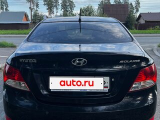 2011 Hyundai Solaris I, чёрный, 650000 рублей, вид 2