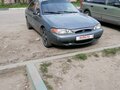 1997 Ford Escort (North America) III, серебристый, 150000 рублей - вид 1