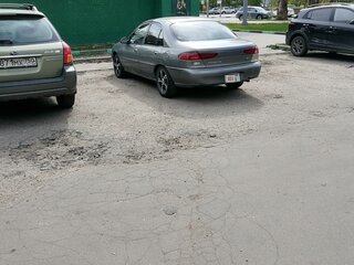 1997 Ford Escort (North America) III, серебристый, 150000 рублей, вид 4