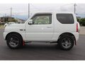 2015 Suzuki Jimny Kei car III Рестайлинг 2, белый - вид 9