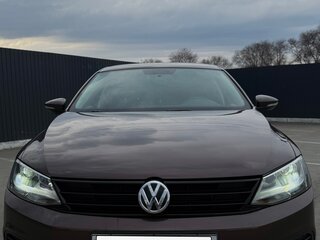 2015 Volkswagen Jetta VI Рестайлинг, коричневый, 1450000 рублей, вид 2
