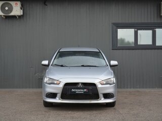 2012 Mitsubishi Lancer X Рестайлинг, серебристый, 659888 рублей, вид 2