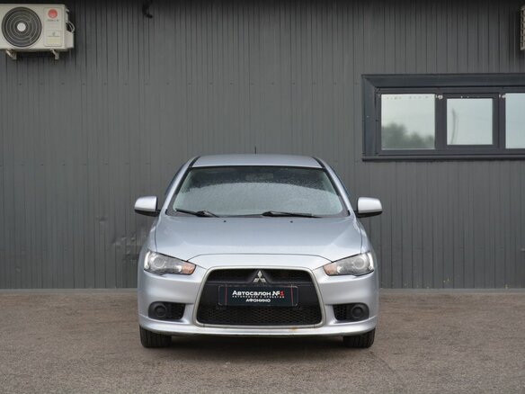 2012 Mitsubishi Lancer X Рестайлинг, серебристый, 619888 рублей - вид 1