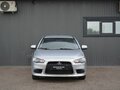2012 Mitsubishi Lancer X Рестайлинг, серебристый, 619888 рублей - вид 1
