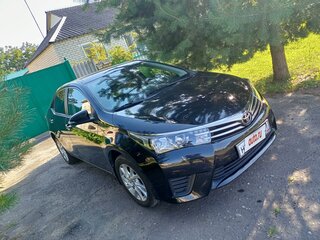 2013 Toyota Corolla XI (E160, E170, E180), чёрный, 1599000 рублей, вид 2