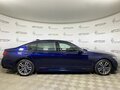 2019 BMW 7 серии Long 745Le xDrive VI (G11/G12) Рестайлинг, синий, 5498800 рублей - вид 4